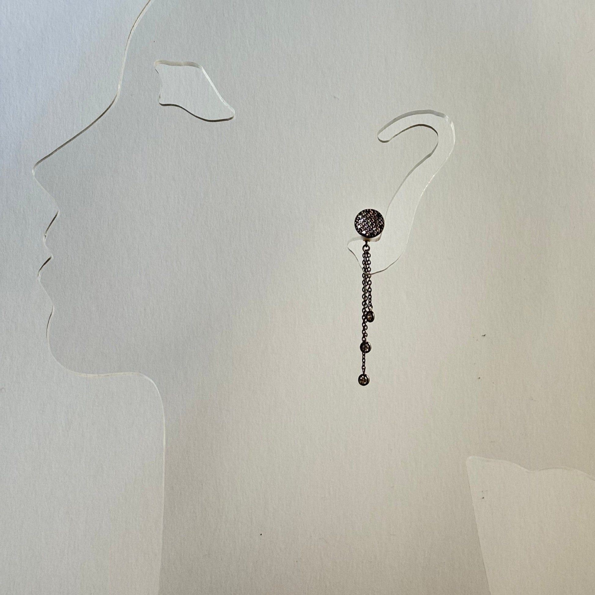 18k Black Gold Drop Chain Earrings with Sparkling Cubic Zirconium on a model