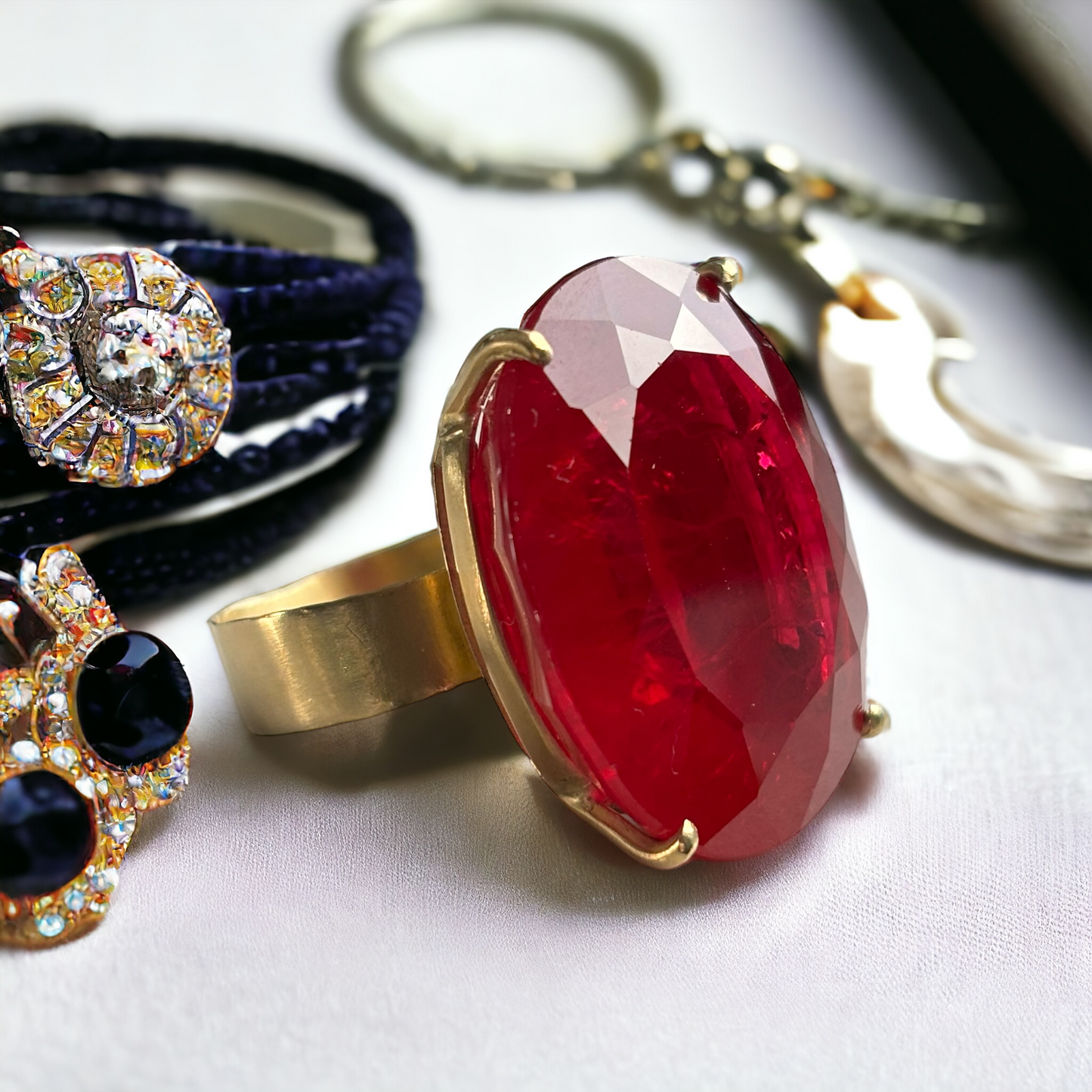 18k Yellow Gold Rubellite Ring, Oval Rubellite and wide band ring surrounded by other jewels