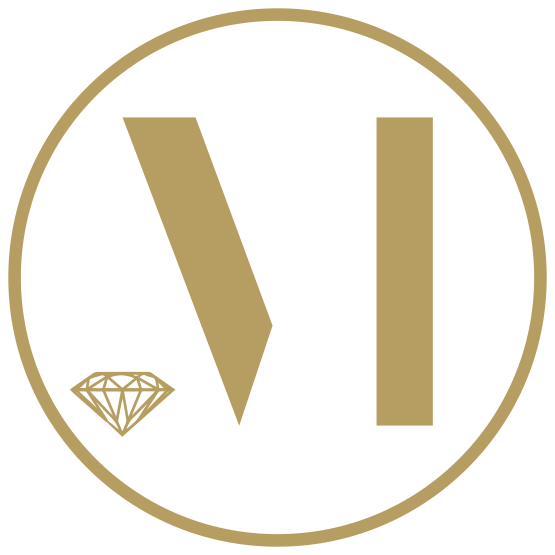 R Mouzannar Jewelry M Logo with a Diamond on the base of the "M"