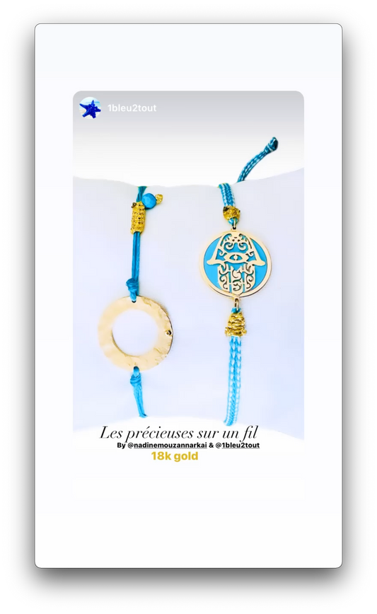 Blue, White, Golden Color and Yellow 18k Gold Hamsa hand on a blue bead Bracelet
