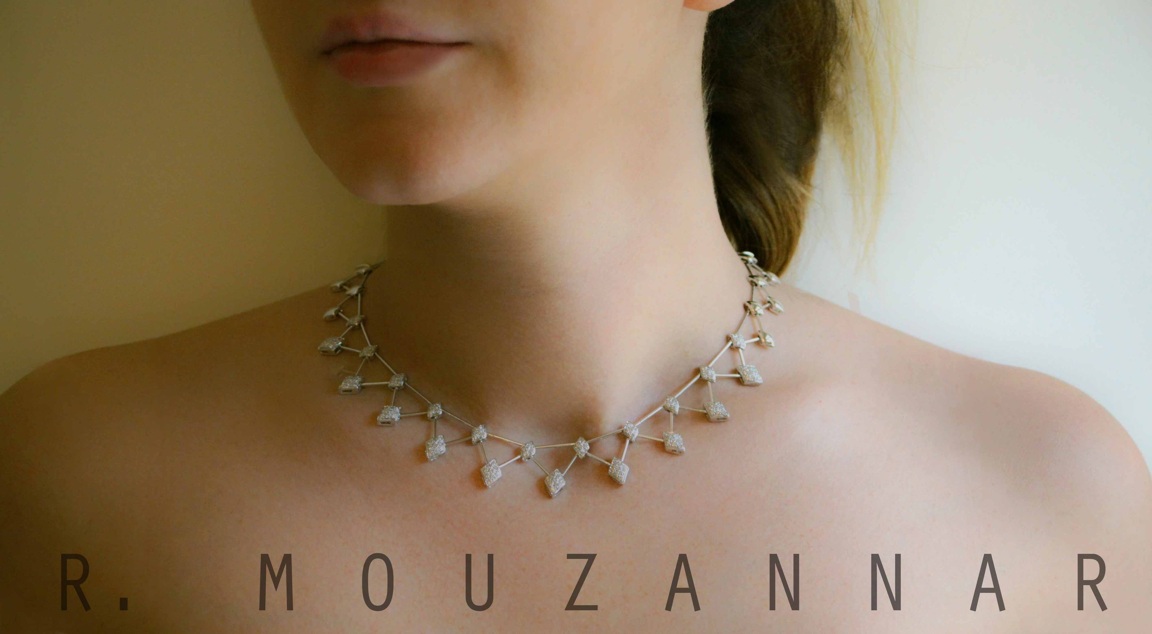 A Model wearing a diamond necklace from the fine jewelry collection of r mouzannar usa